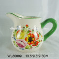 Ceramic teapot with flower decal design